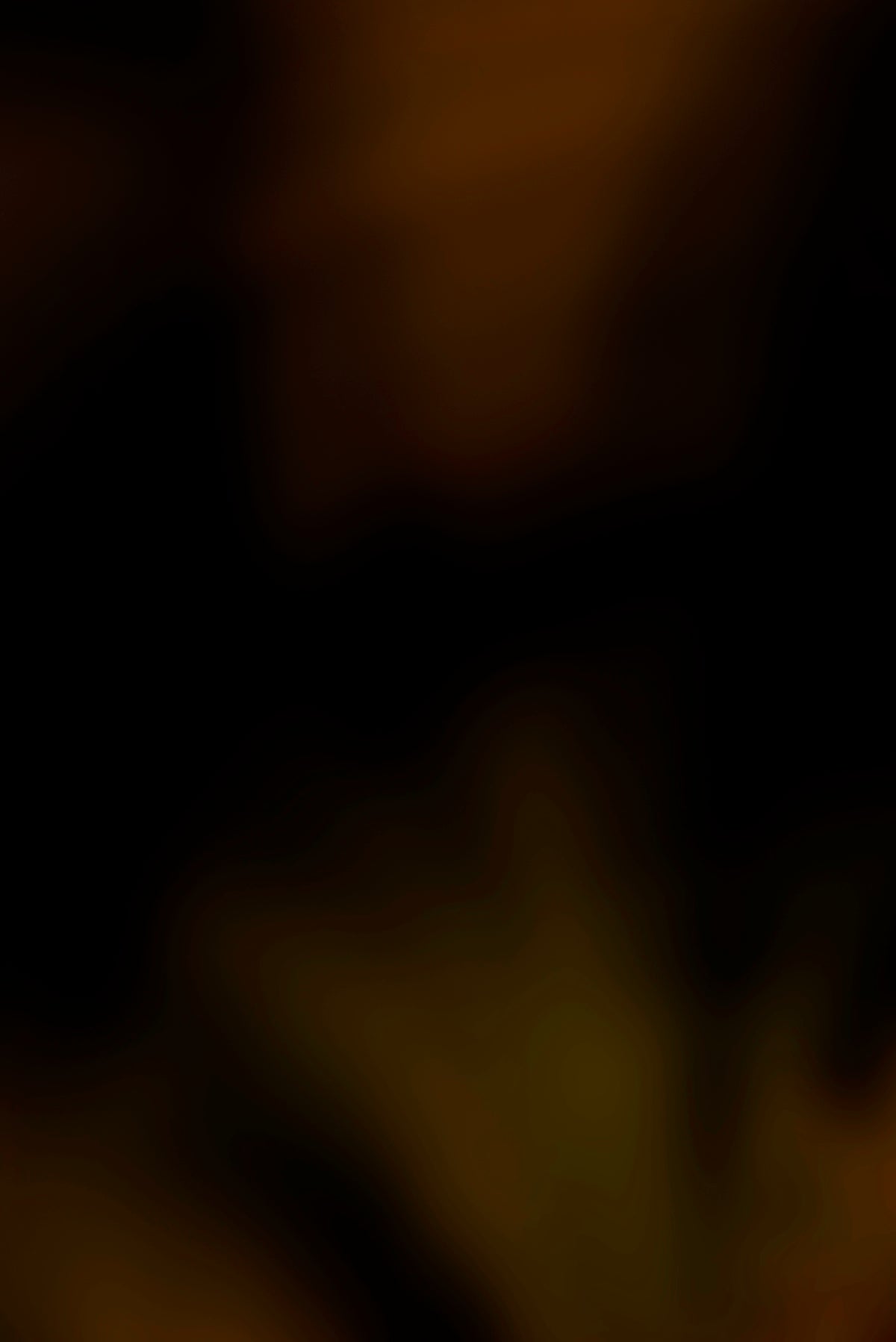 a blurry photo of a banana on a plate