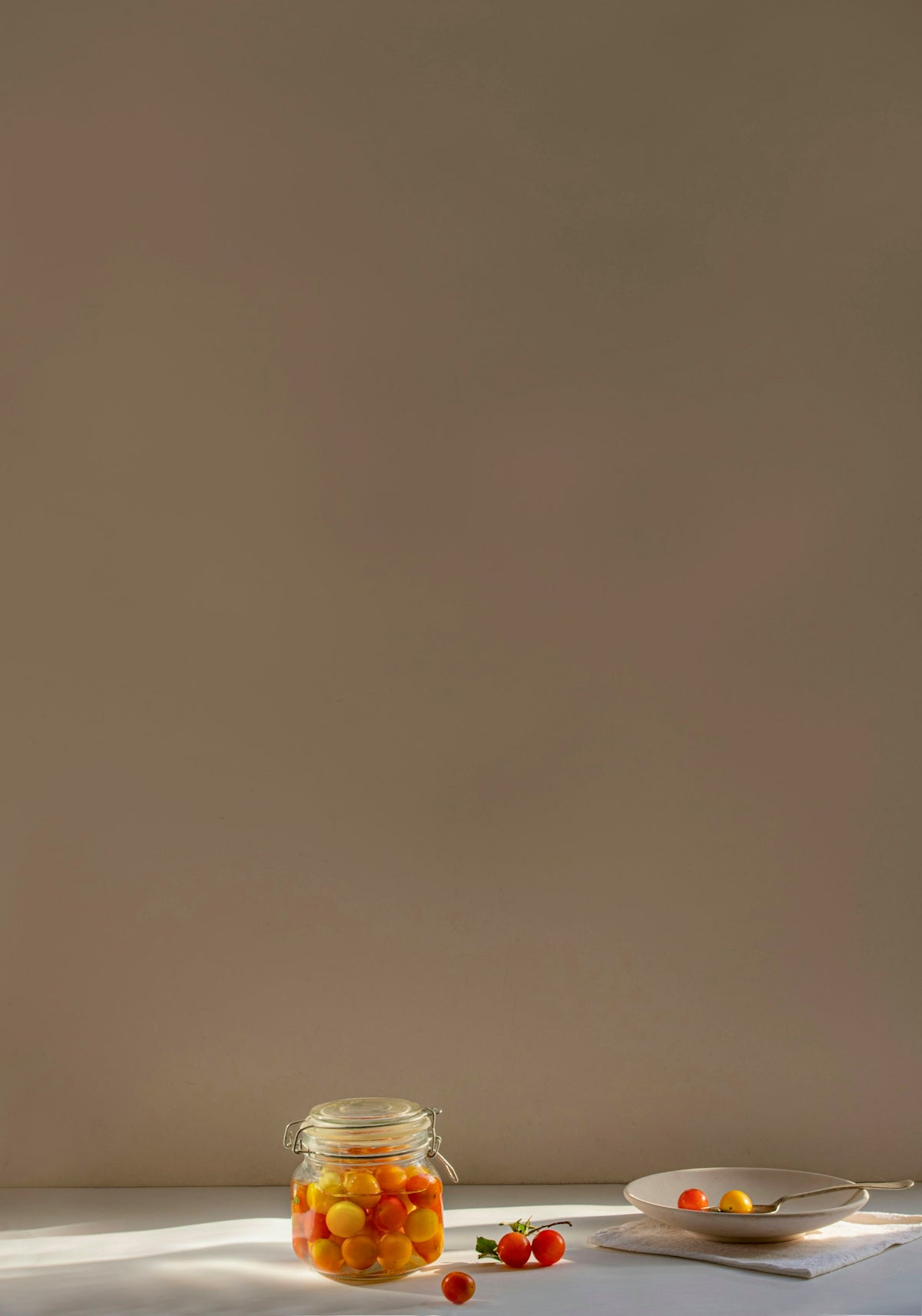 a jar of jelly beans sitting on a table